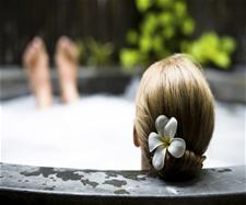 Female in outdoor sauna Female in outdoor sauna